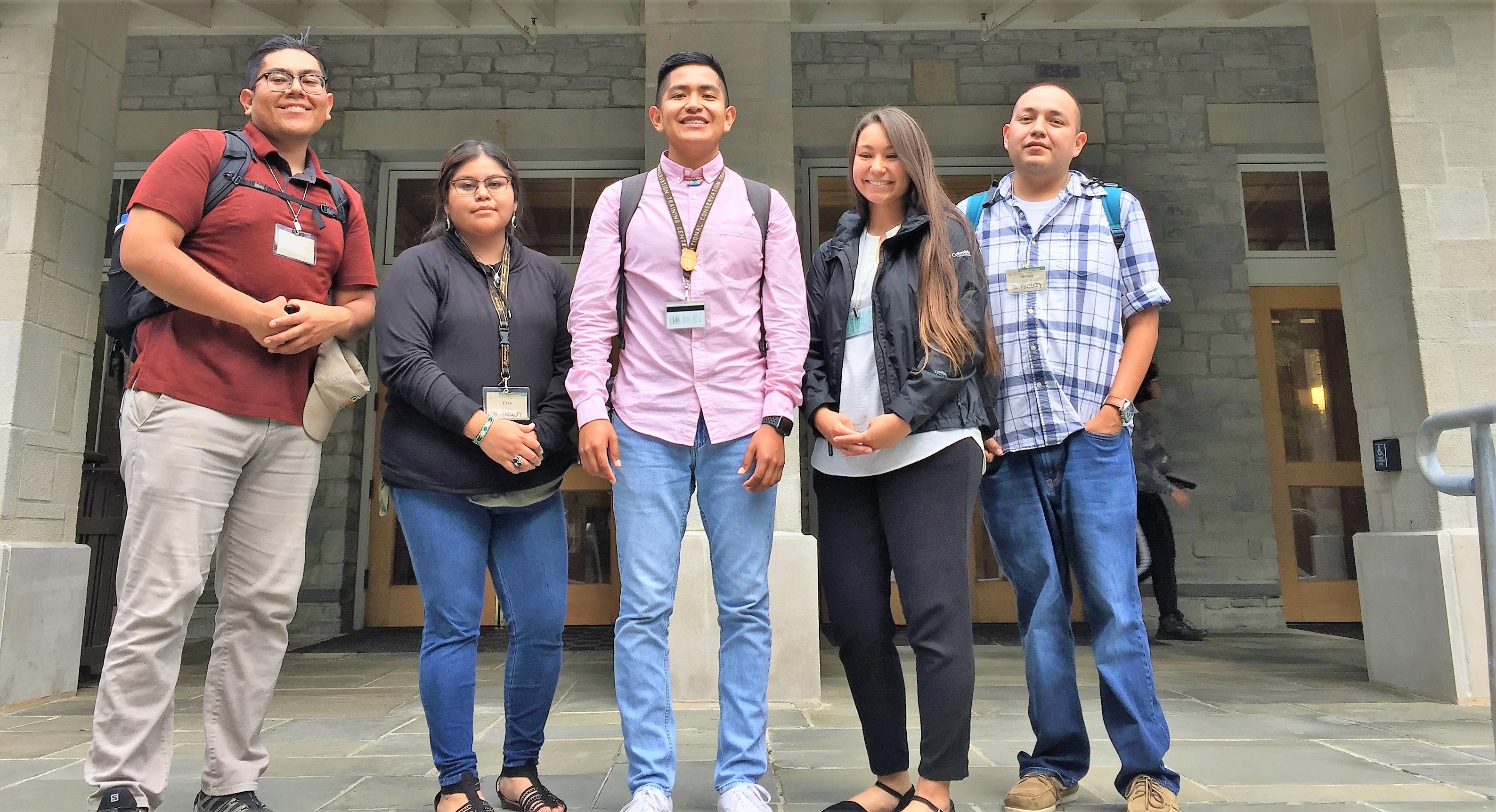 Group photo of younger individuals in front of the Lincoln memorial