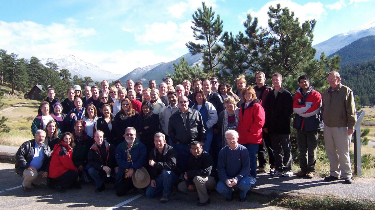 Group photo of employees outside
