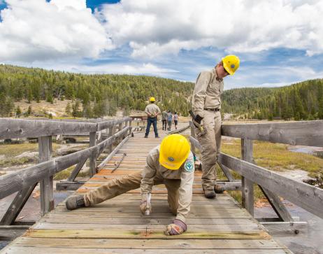 Youth Conservation Core crew repairs boardwalks around Firehole Lake
